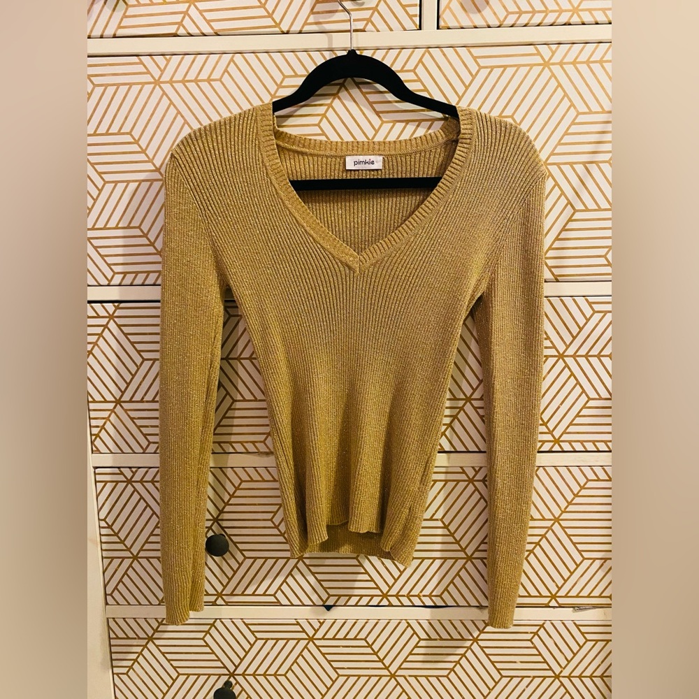 gold sweater